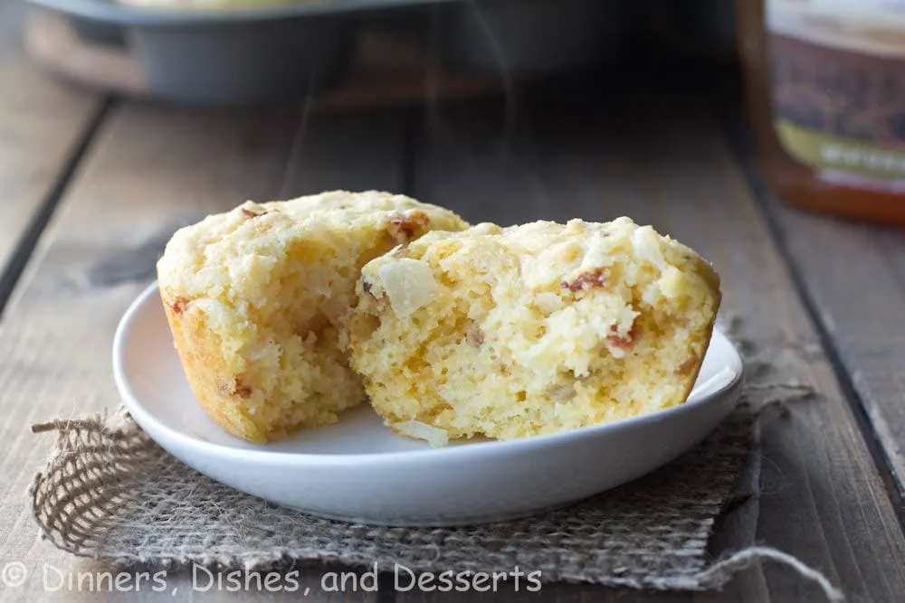 bacon onion and cheddar corn muffins on a plate