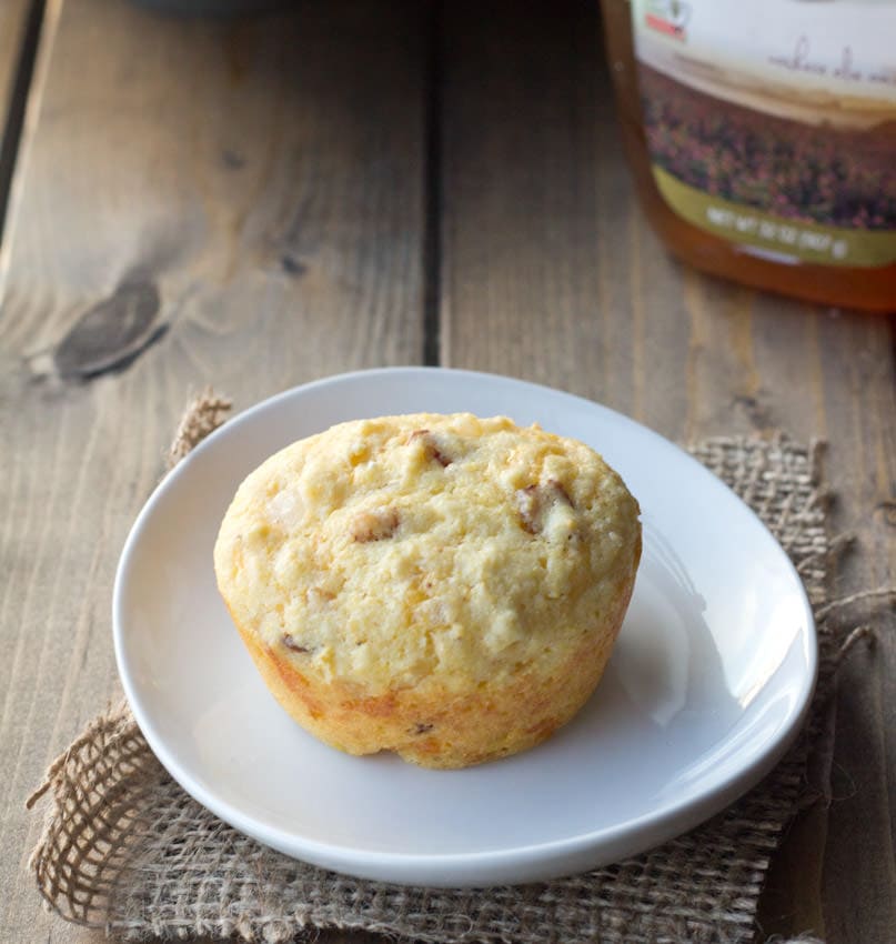 bacon onion and cheddar corn muffins on a plate