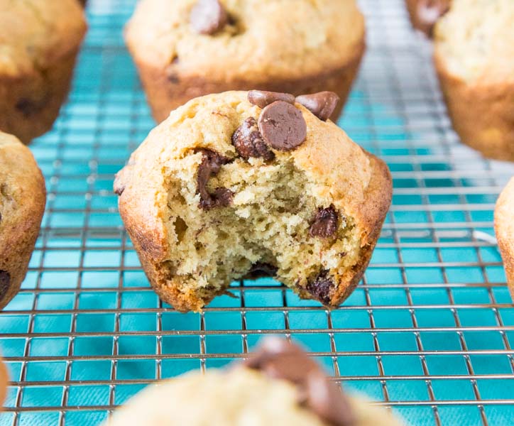 A close up of muffins on a cooling rack