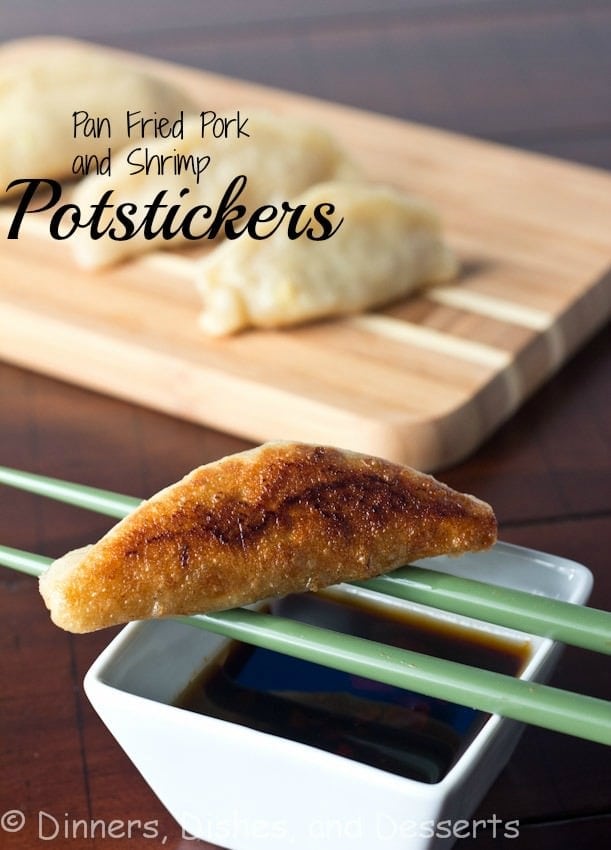 pan fried shrimp and pork potstickers on a board