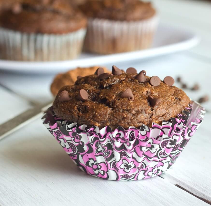 Banana Chocolate Chip Muffins - healthier banana muffins made with whole wheat flour and honey. Tender, moist, and actually pretty good for you!