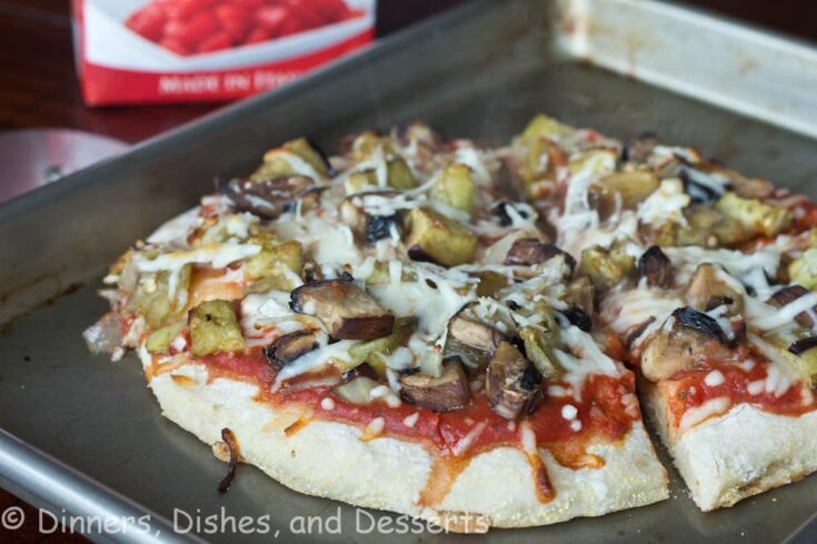 roasted veggie pizza on a pan