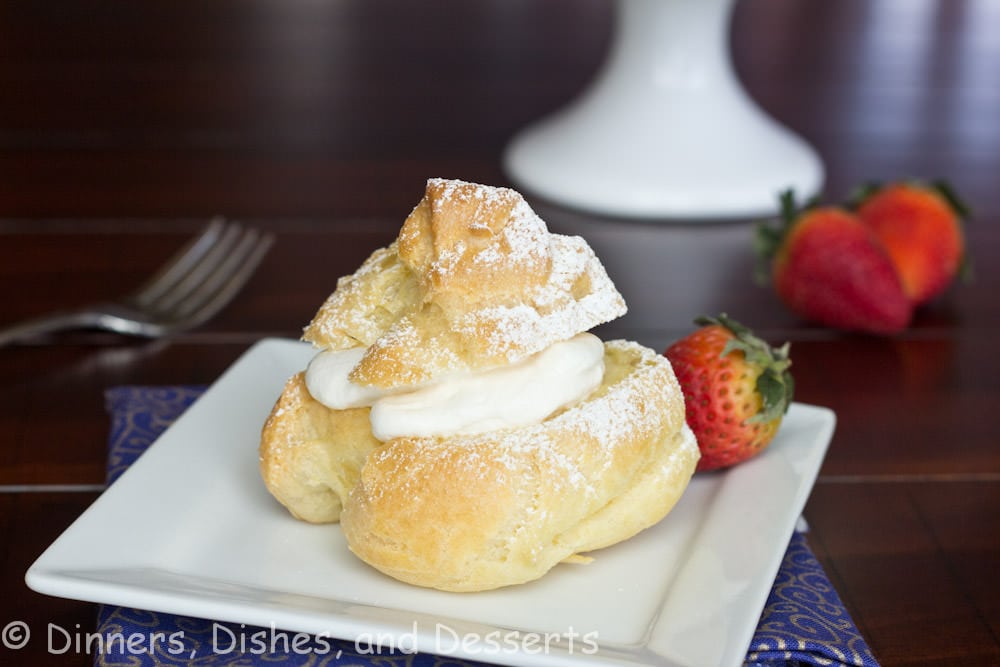 A cream puff on a plate, with Cream and Pastry