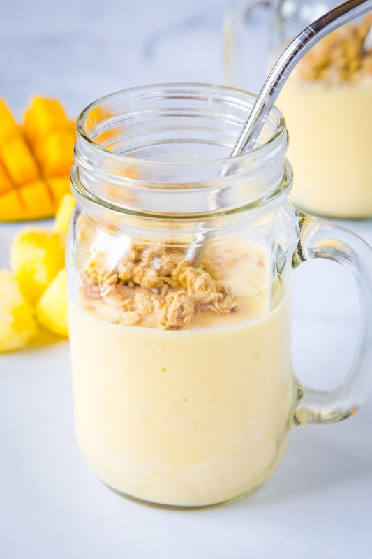 mango pineapple smoothie in a glass
