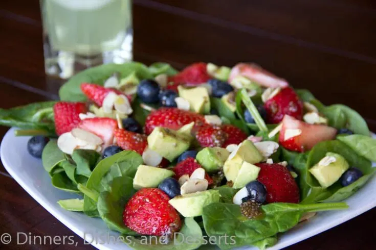 berry almond salad with chia seed vinaigrette on a plate