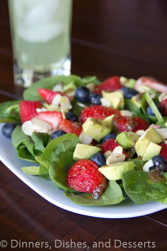 berry almond salad with chia seed vinaigrette on a plate