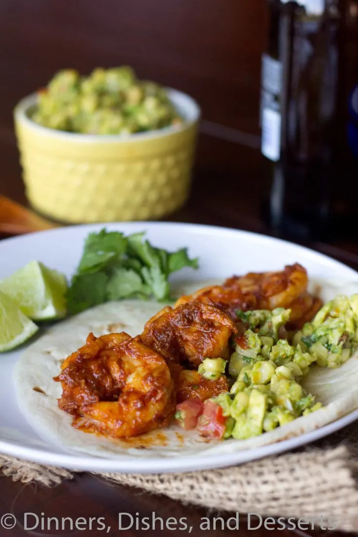 chile spiced shrimp tacos on a plate