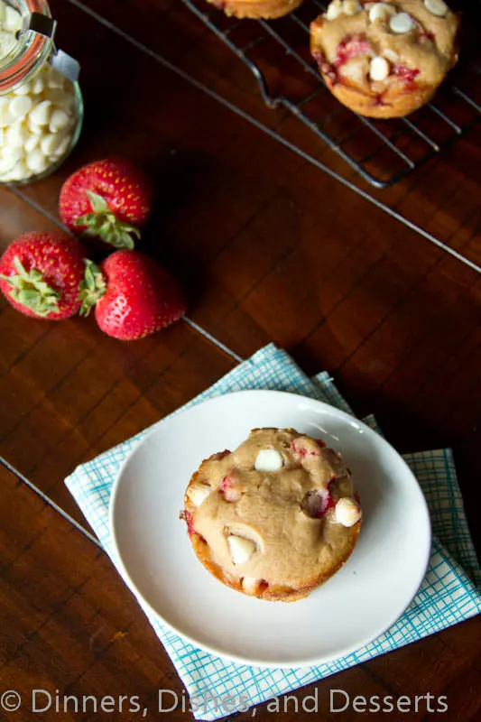 strawberry white chocolate chip muffins on a plate