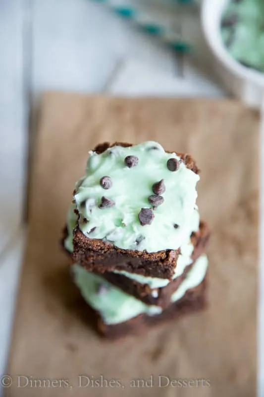 fudgy mint chocolate chip brownies on a board