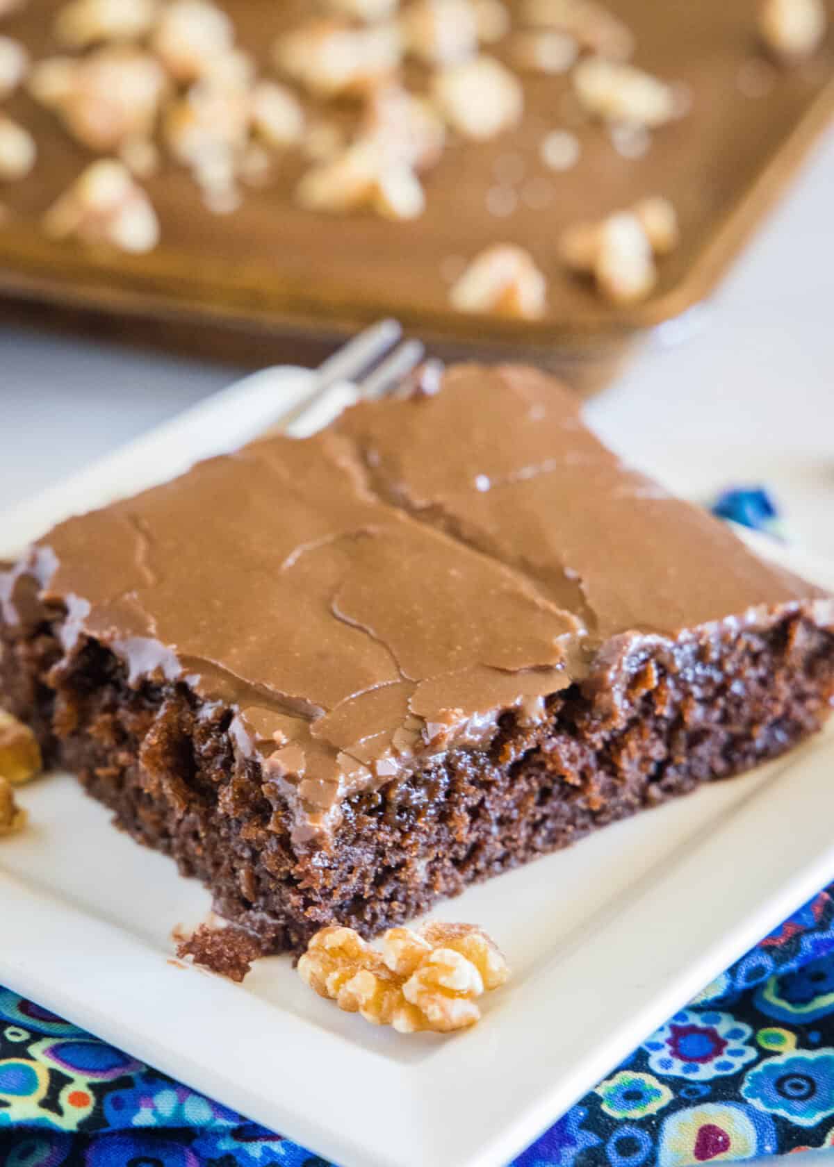 slice of chocolate sheet cake on a white plate