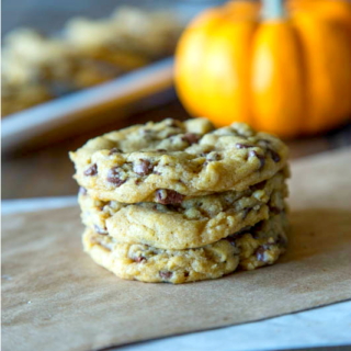 chewy pumpkin chocolate chip cookies on a board