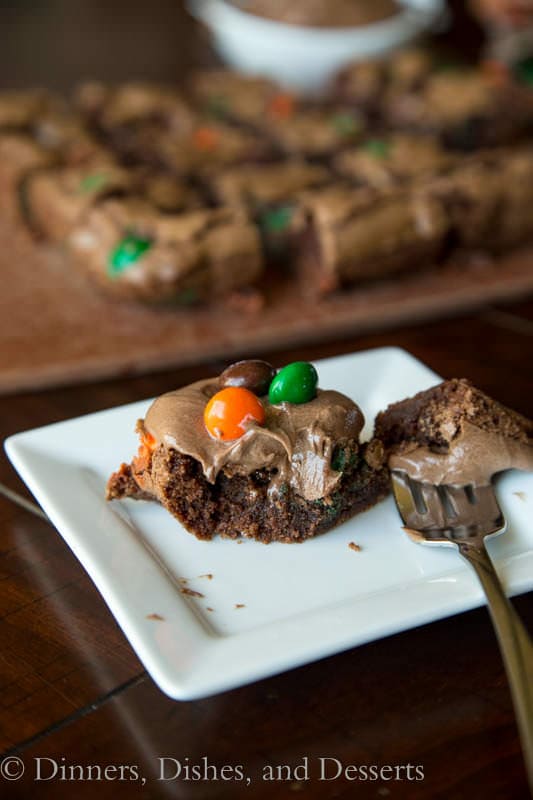 pumpkin spiced m&m brownies on a plate