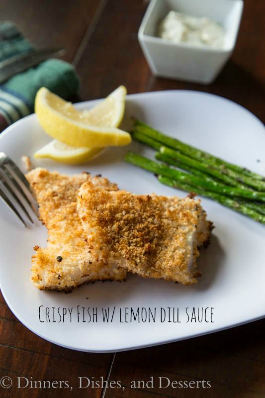 crispy fish with lemon dill sauce on a plate