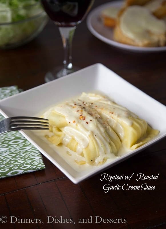 chicken and cheese rigatoni with roasted garlic cream sauce on a plate