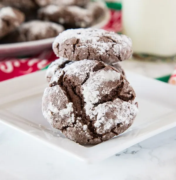 Chocolate Crinkle Cookies - Rich and fudgy chocolate cookies coated in powdered sugar. A classic cookie that is perfect for the holidays or any time of year!