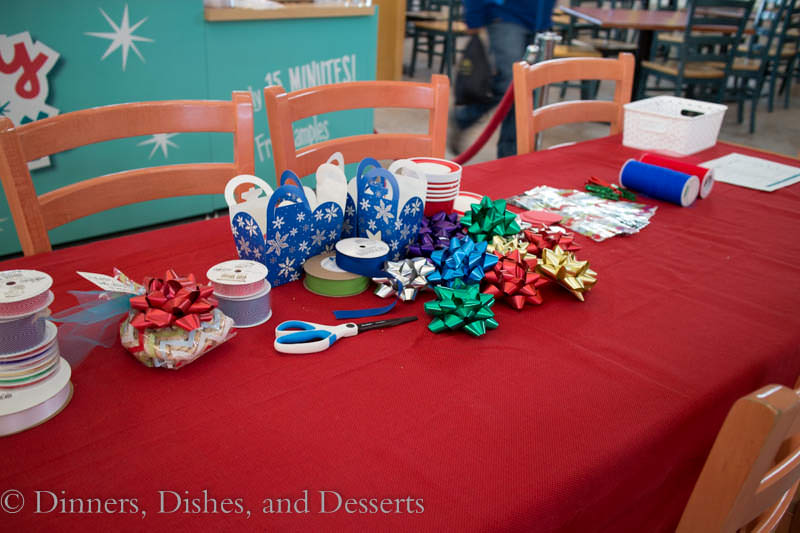 ribbons and present wrapping supplies on a table