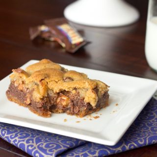gooey chocolate chip toffee bars on a plate