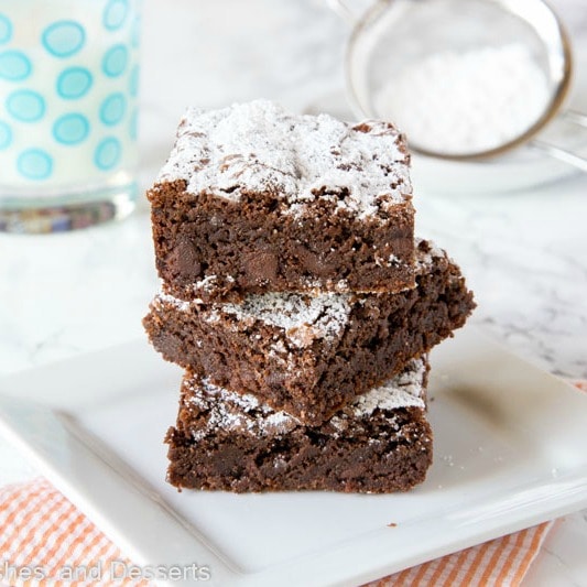 Nutella Brownies - an absolute chocolate lover's dream! Homemade brownies filled with 3 kinds of chocolate for an absolutely delicious treat!