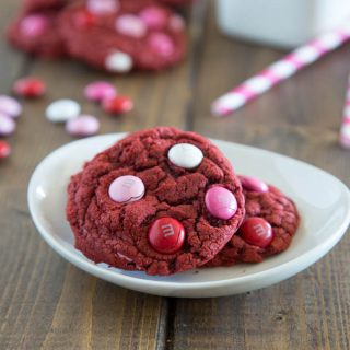 Red Velvet M&M Cookies - thick and chew cake mix cookies with just a couple ingredients. Use with any cake mix, and add whatever mix-ins you like!