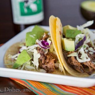 slow cooker chipotle beef tacos on a plate