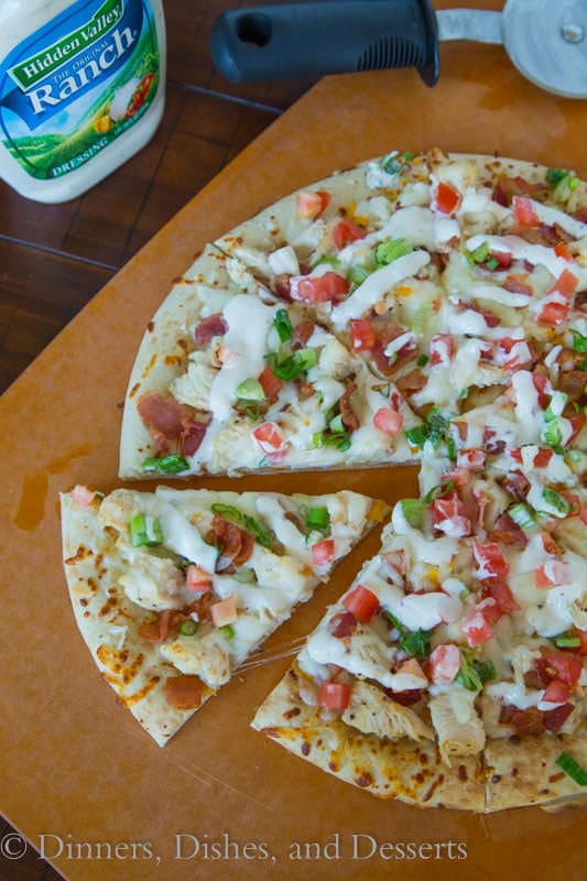 chicken bacon ranch pizza on a board