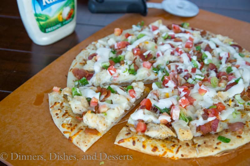 chicken bacon ranch pizza on a board