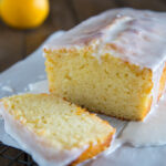 grapefruit yogurt cake sliced on a board