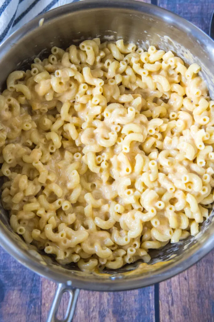A pot full of cooked elbow macaroni