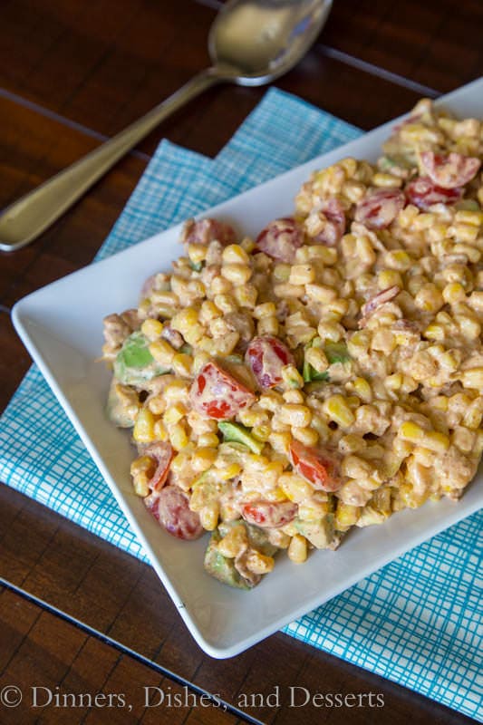Southwestern Corn Salad - Corn with bacon, avocado, and tomatoes in a creamy Southwestern style dressing