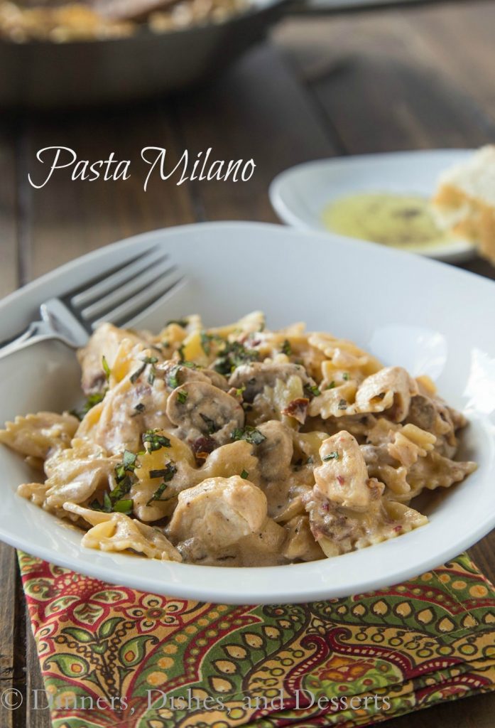 Pasta Milano - A homemade version of Macaroni Grill's Pasta Milano. A creamy garlic and sundried tomato sauce, with chicken and mushrooms, over bowtie pasta