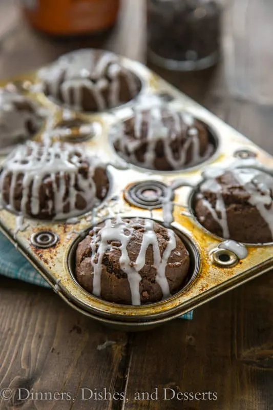 Chocolate Pumpkin Muffins with Pumpkin Spiced Glaze - great snack, breakfast, or lunch box treat for fall