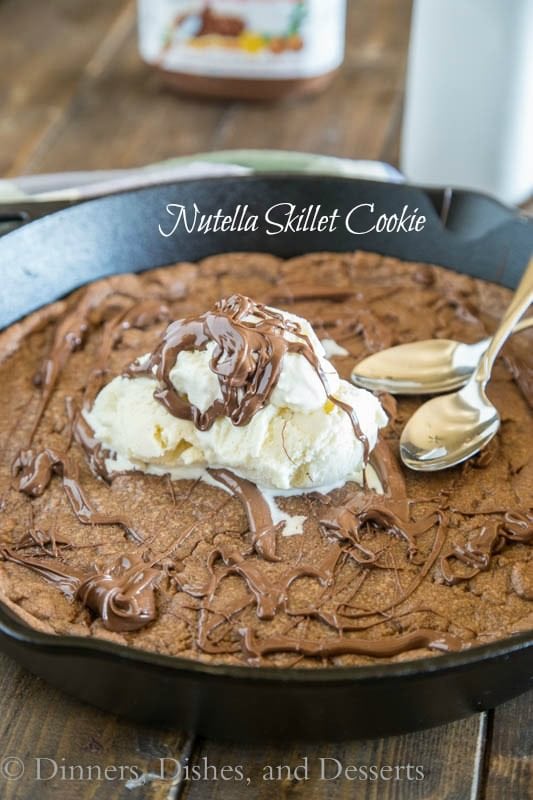 Nutella Skillet Cookie - a nutella based chocolate chip cookie baked into a cast iron skillet, with a layer of nutella in the middle! 