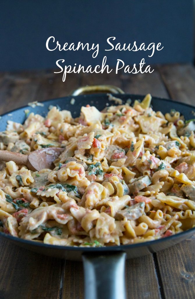 Sausage spinach pasta is quick, easy, and sure to please the entire family. A creamy tomato sauce gives it tons of flavor!