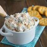 Cheddar Green Olive Dip - A creamy, cheesy, salty green olive, dip that is great warm or cold. 
