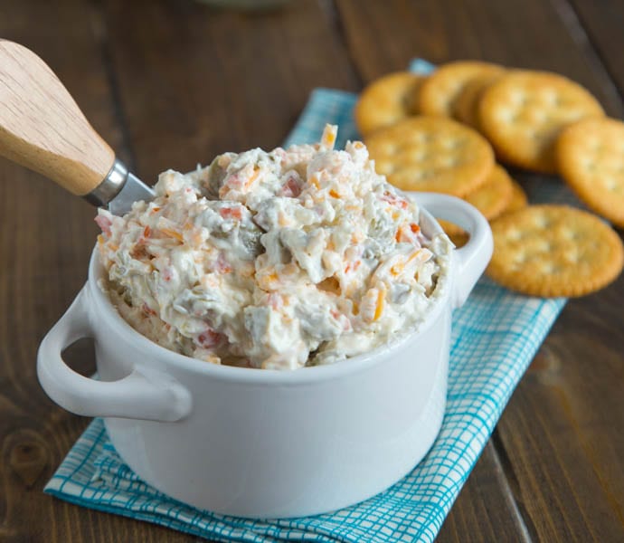 Cheddar Green Olive Dip - A creamy, cheesy, salty green olive, dip that is great warm or cold. 