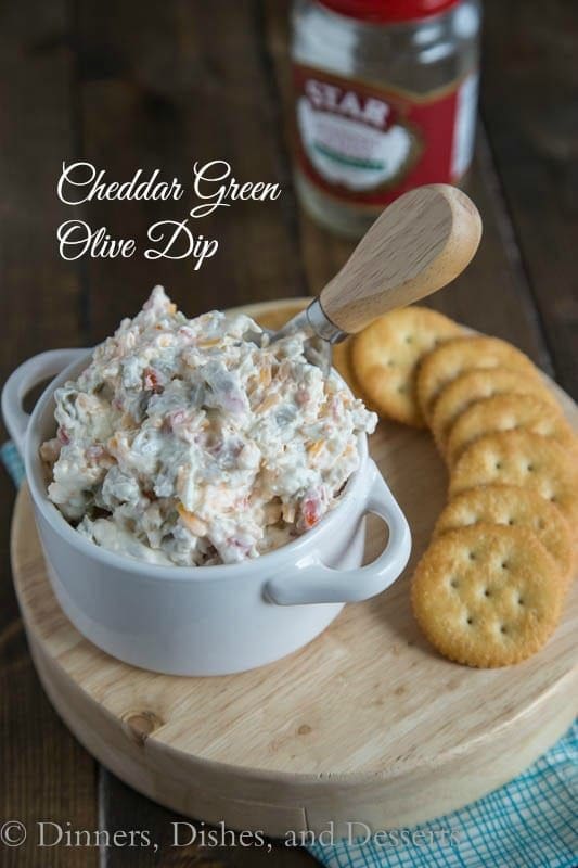 Cheddar Green Olive Dip – A creamy, cheesy, salty green olive, dip that is great warm or cold.