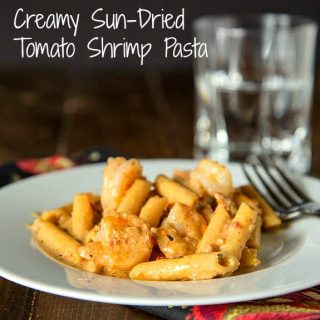 Creamy Sun-dried Tomato Shrimp Pasta - a super easy pasta dish with shrimp, and a super creamy delicious sun-dried tomato sauce.