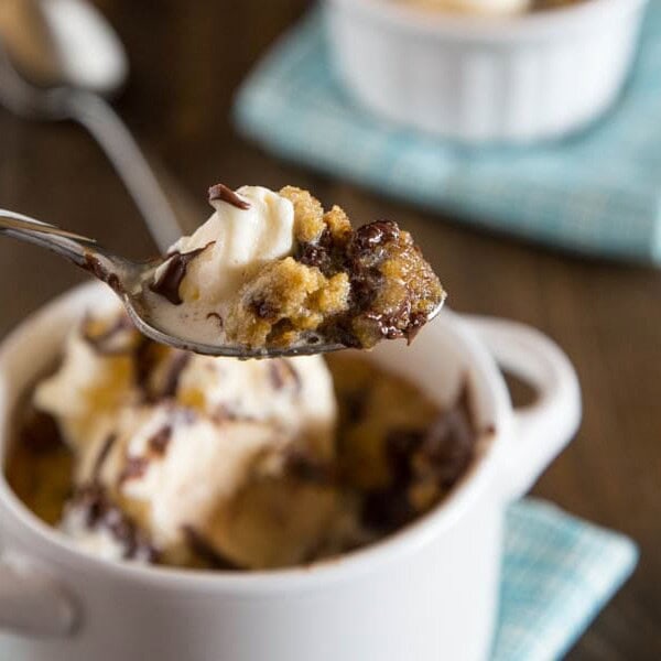 Deep Dish Chocolate Chip Cookies for Two -An ooey, gooey, chocolate-y deep dish cookie that makes just enough for two people. A homemade version of the famous Pizookie.