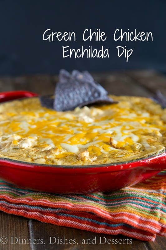 Green Chile Chicken Enchilada Dip - Bubbling hot gooey, cheesy enchilada dip. Turn your favorite green chile chicken enchiladas into a dip perfect for game day.