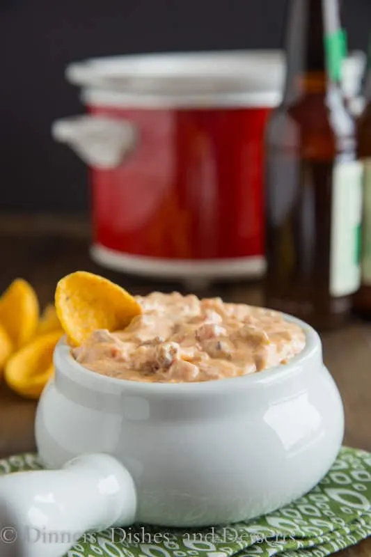 Hot Sausage Dip - a creamy, cheesy, hot sausage dip that is perfect for any get together. Make ahead and heat in the crock pot for the big game!