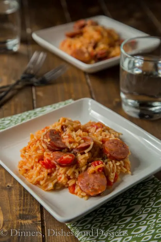 Spicy Sausage Spanish Rice Skillet – turn box rice mix into a full meal! Just one pan, and a couple ingredients and you have a whole meal the family will love! 