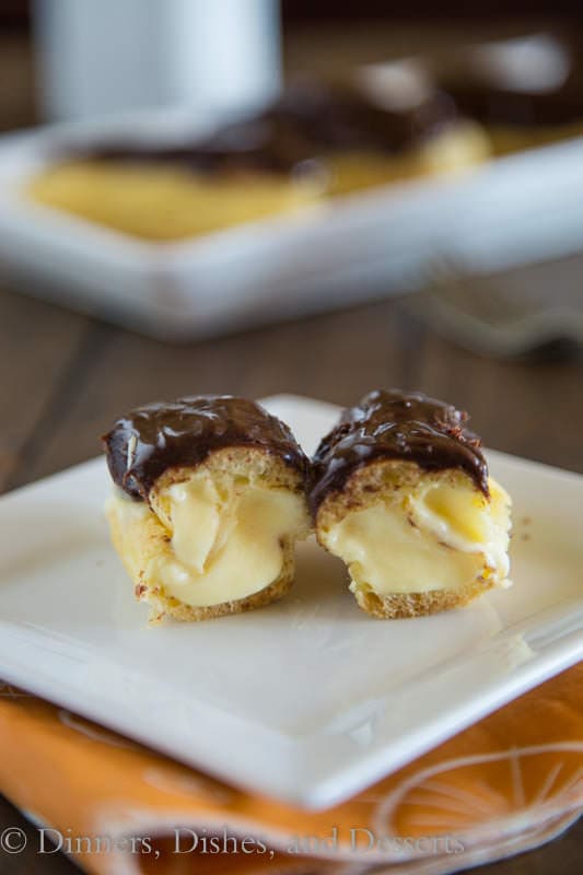 Chocolate Elclairs - my husband's favorite dessert! Pastry filled with vanilla cream and topped with chocolate ganache