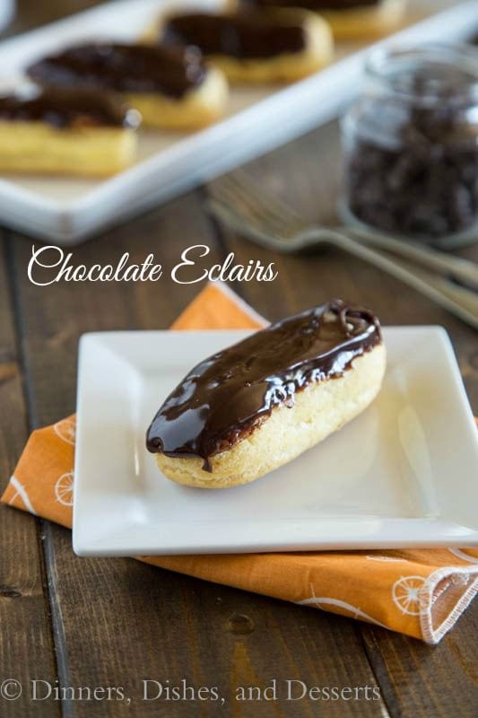 Chocolate Eclairs - Light and airy pastry filled with a vanilla cream, and then topped with a chocolate icing. Sure to impress, but way easier than you think to make!