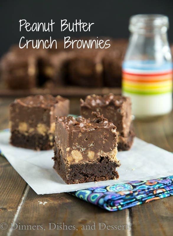 Peanut Butter Crunch Brownies - A fudgy brownie, topped with a layer of peanut butter cups, and then a layer of chocolate/peanut butter crispy fudge. Pure chocolate and peanut butter heaven!