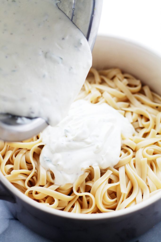 creamy pasta with ricotta mint and garlic sauce in a bowl