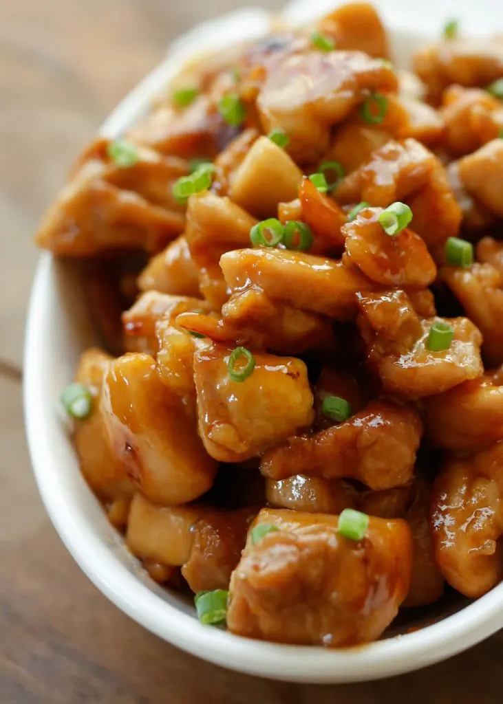 Sweet and just a little bit spicy, these Honey Sriracha Chicken Bites disappeared lightning fast. Tender, bite size chunks of chicken cook in just minutes and then are tossed with an irresistible sticky glaze.