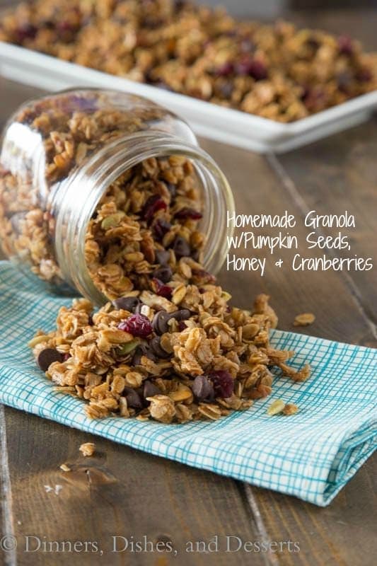 Homemade Granola with Pumpkin Seeds, Honey & Cranberries - homemade crunchy granola made with honey, brown sugar, pecans, pumpkin seeds, cranberries and chocolate chips. Breakfast just got a whole lot better!