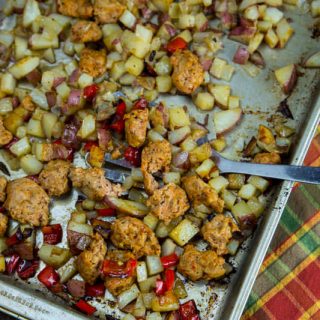 Oven Roasted Potatoes & Sausage - I love an easy one pan meal! This puts oven roasted potatoes with veggies and sausage, all on one pan