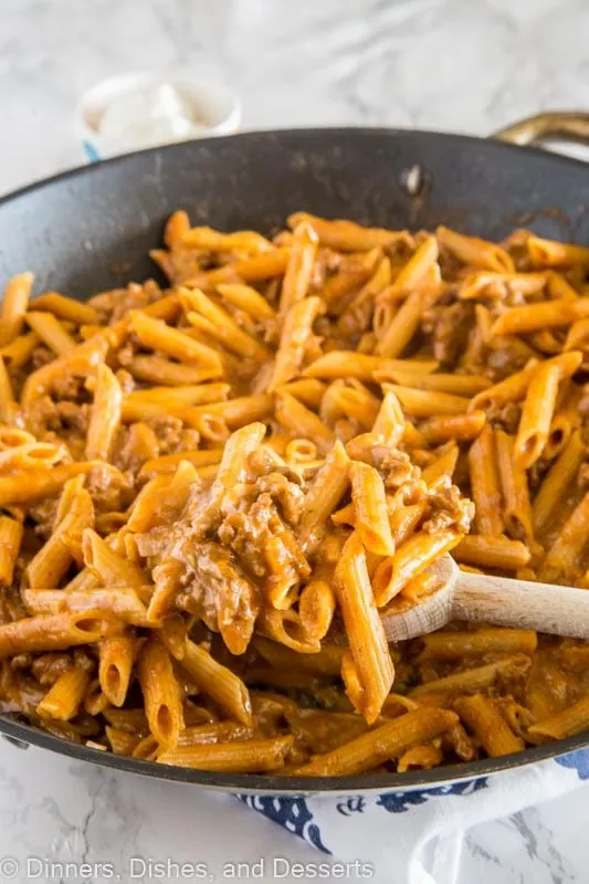 penne pasta with ground beef in a skillet