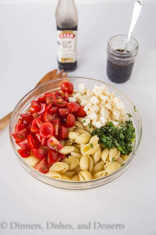Caprese Pasta Salad - turn classic caprese salad into a quick pasta salad. Great for summer get togethers, quick lunches, or a light dinner!